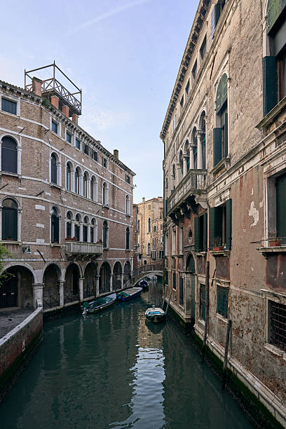 istock Venetian Canal with Historic Buildings 2239938214