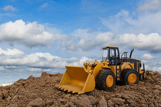 istock Wheel loader are digging the soil in the construction site . 2239941640