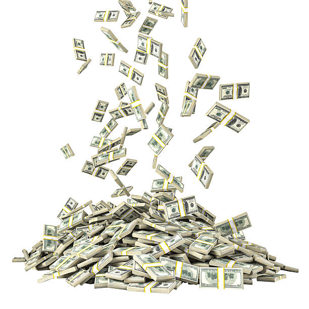 istock Money bundles falling creating a large pile of wealth 2239942953