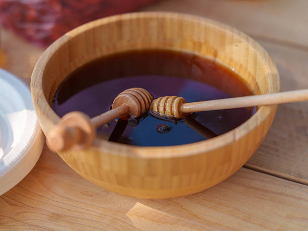 istock Natural Honey in Wooden Dish 2239946282
