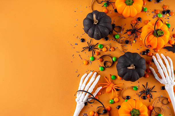istock Bright colorful Halloween party accessories and decor background 2239946541