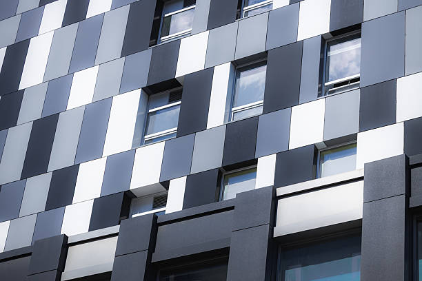 istock panel building modern office architecture facade exterior wall background view with square shape pieces and windows perspective surface 2239946642
