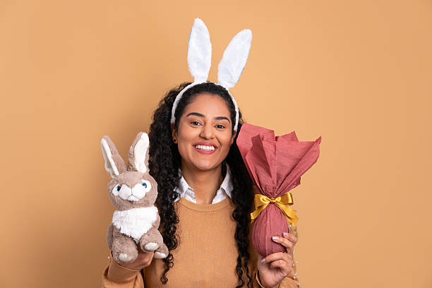 Chocolate Easter bunny and chocolate eggs on a white background