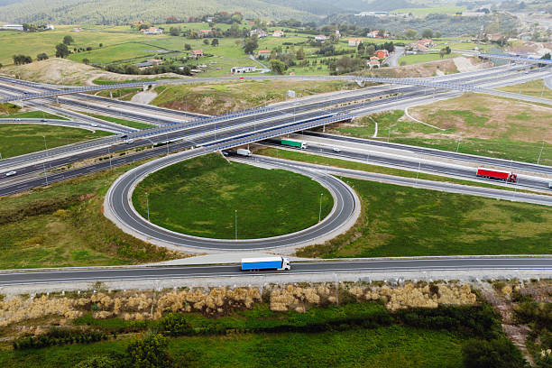 istock Trucks in a highway junction 2239950283