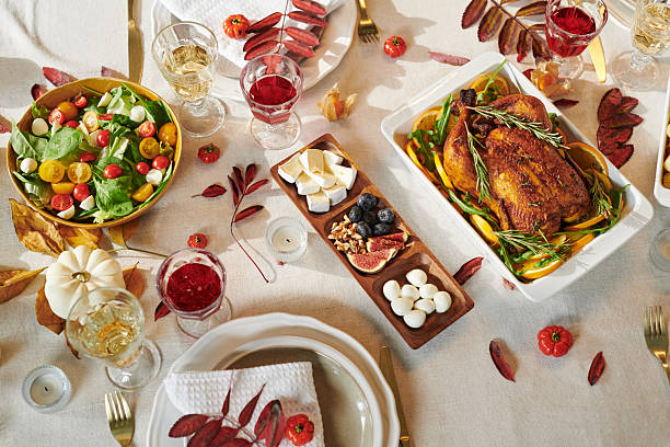 istock Thanksgiving Table Setting Featuring Roast Chicken and Fresh Autumn Inspired Salad 2239952268