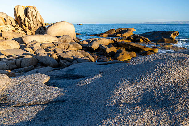 Elevated view of rugged coastline, beach and sea, Corsica