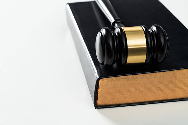 Wooden gavel on the book.