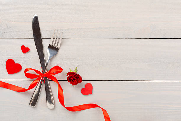 istock Festive table setting for Valentine's Day on wooden background, top view 2239963581