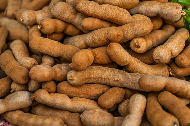 Fresh tamarind fruit for sale at a market