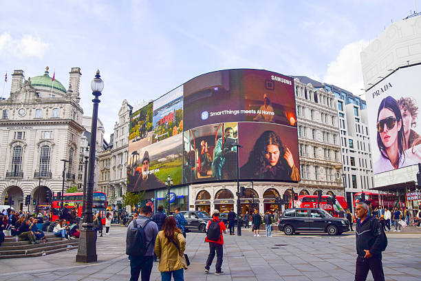 London, UK - September 16 2025:  people walk along Piccadilly Circus, daytime view.