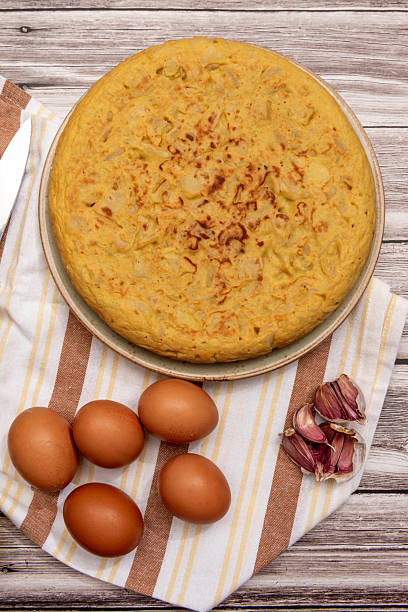 istock According to some, the potatoes should be cooked rather than fried and they should be left in the beaten egg for a while so that they soak up and acquire the right consistency 2239969850