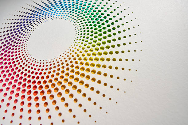 istock Colorful radial dot pattern cut from paper forming rainbow gradient mandala 2239973597