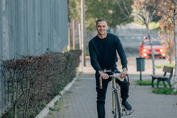istock cyclist in the city riding a bicycle 2239976036