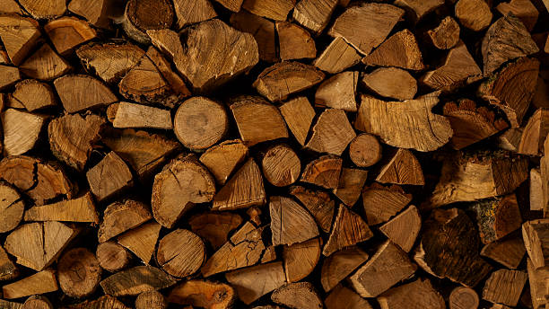 istock Neatly stacked firewood ready for winter warmth and cozy nights. 2239978064