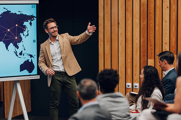 istock Speaker presenting global business strategy to an audience 2239979998