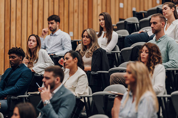 istock Group of people attending business conference or lecture 2239980207