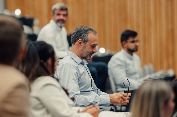 istock Business people attending a professional conference or lecture 2239980328