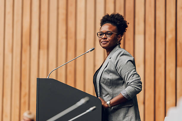 istock Black businesswoman doing public speaking at conference 2239980744
