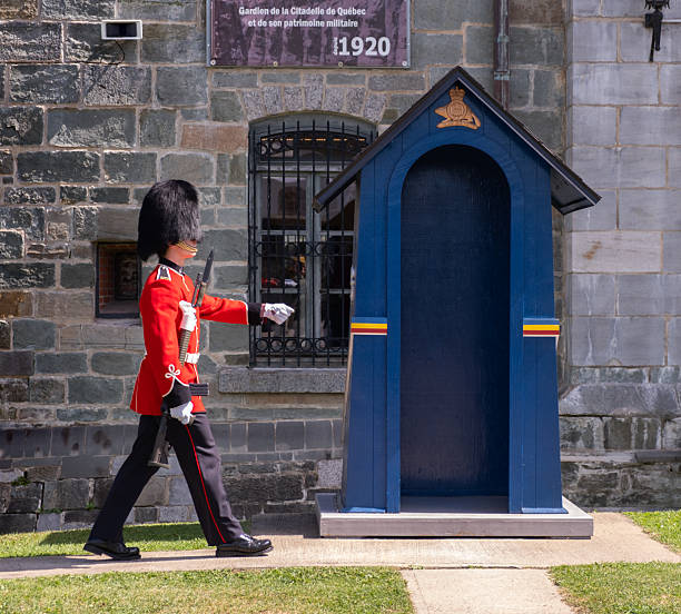 A member of the Royal 22e Regiment’ performs his formal guard duties at Quebec City Citadel, a fortress that stands as a testament to Quebec City’s history, built to safeguard both the city and the St. Lawrence River from potential invasion.