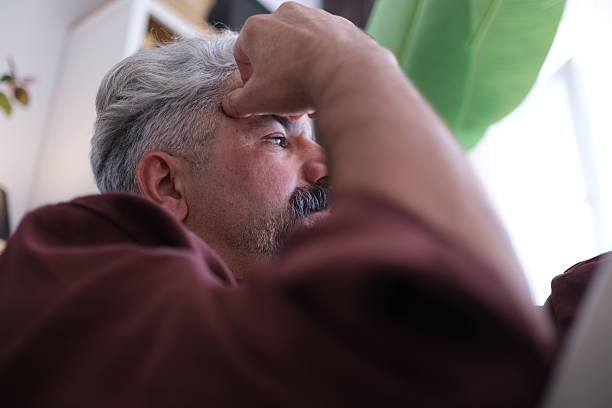 Pensive lost in thoughts suffering from depression
