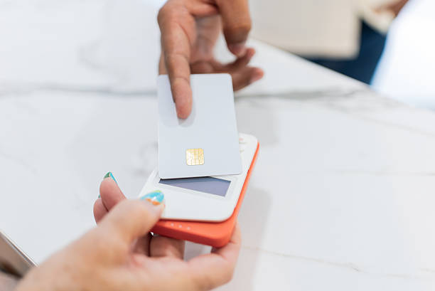 istock Person paying for pedicure service using credit card 2239998068