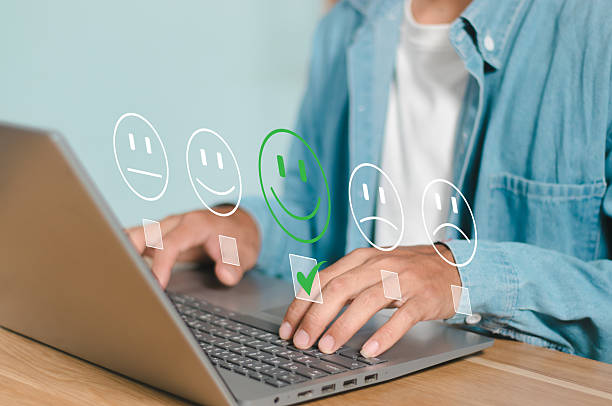 Customer using tablet give five star rating, Submit satisfaction survey through online application. Positive feedback highlight excellent service and product quality, improving brand reputation.