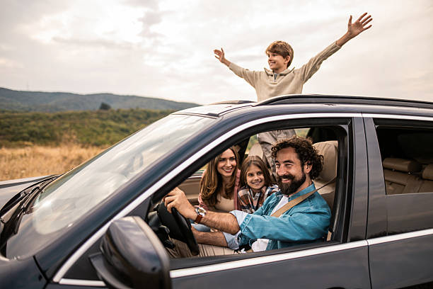 istock Happy family going on a road trip by car. 2240000534