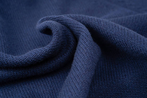 istock Navy blue merino wool sweater texture as background. Top view. 2240001625
