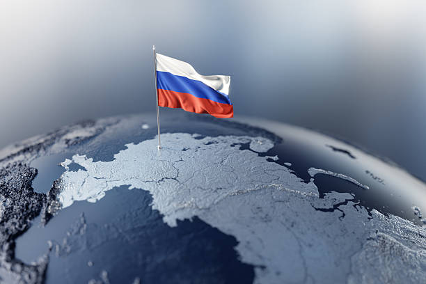 A Russian flag is pinned to a textured globe over Europe, illustrating national identity, international relations, and geopolitics. Ideal for news, analysis, and discussions about Russia's global role.