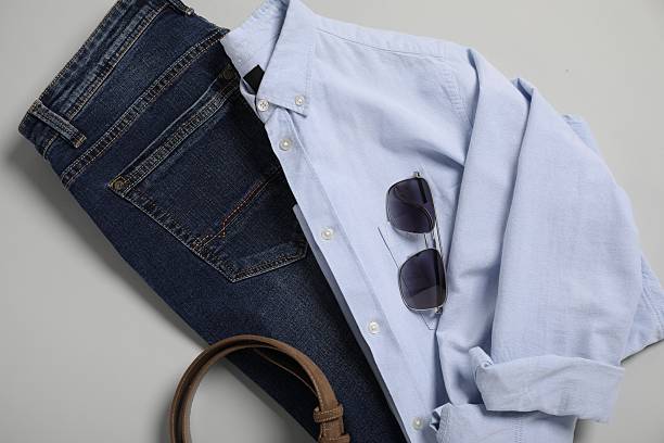 Stylish clothes and accessories on light grey background, flat lay