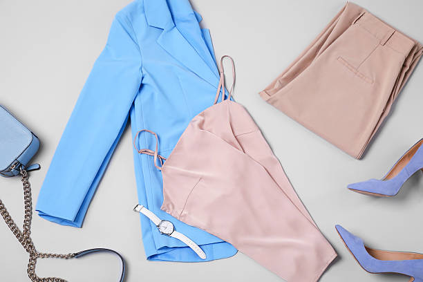istock Stylish clothes, heels and accessories on light grey background, flat lay 2240002126
