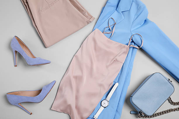 istock Stylish clothes, heels and accessories on light grey background, flat lay 2240002145