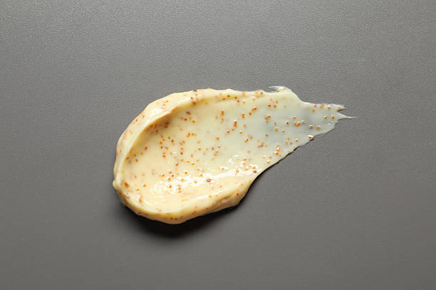 istock Smear of body scrub on grey background, top view 2240002692