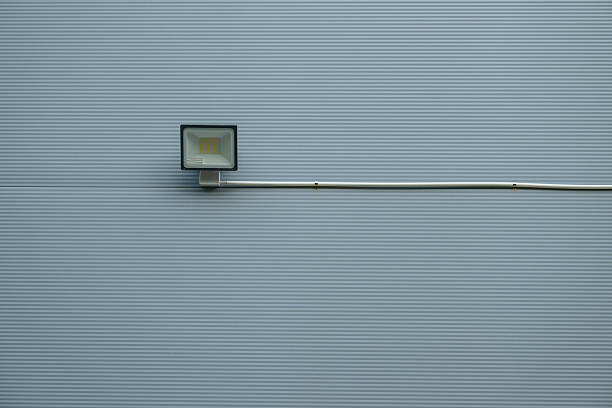 istock Minimalist outdoor wall lamp on grey background.. 2240005025