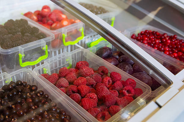 Frozen berries and fruits on a store counter