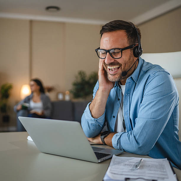 istock Man working remotely having online video call at home 2240005784
