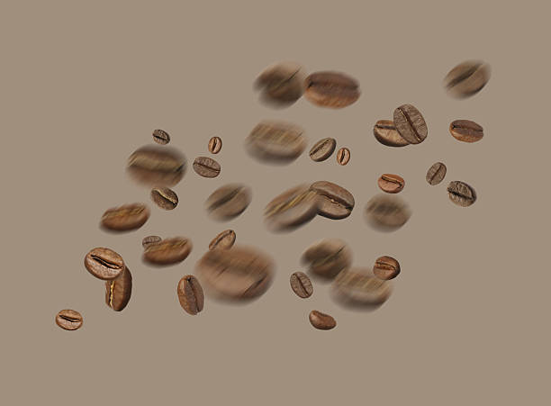 Aromatic roasted coffee beans in air on grey background