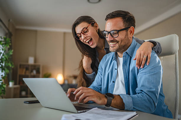 istock Couple planning finances and working from home together 2240005987