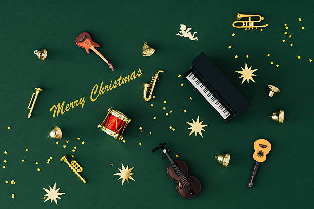 istock Unique pattern made of various musical instruments and golden glitter star confetti on green background. Christmas and New Year concept. Festive holiday music layout. Creative party flat lay image. 2240008989