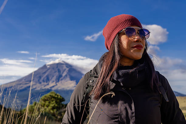 istock Hiker with backpack enjoying mountain view and clear blue sky 2240009869