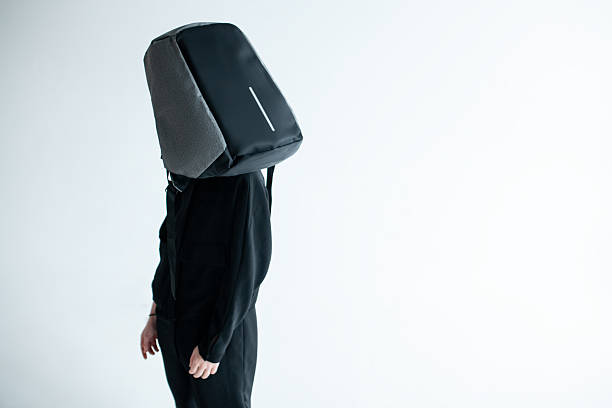 istock stylish hipster person holding modern backpack bag on white background 2240012637