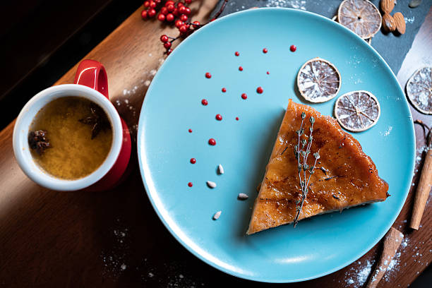 istock slicing fresh cheese or peer cake with mousse and cream and caramel crust 2240015492