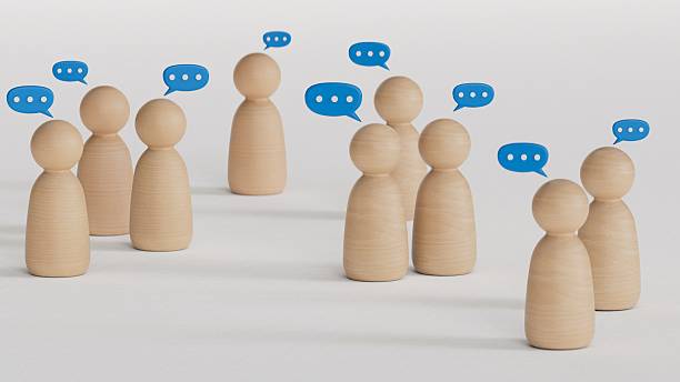 istock Team discussion, Community or social feedback. Communication or announcement dialog. Business meeting. Teamwork and communication concept. Many wooden figure with speech bubble. 2240028378