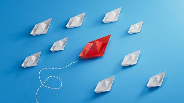 istock Successful business, innovative and solution concepts.Paper boat . - leader boat, teamwork ,Abstract, blue, Business.3D rendering on blue background. 2240028401