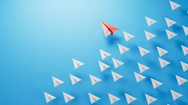 istock Different business concept.new ideas. paper art style. creative idea.Leaderplane concept with red paper plane leading among white.3D rendering on blue background. 2240028408