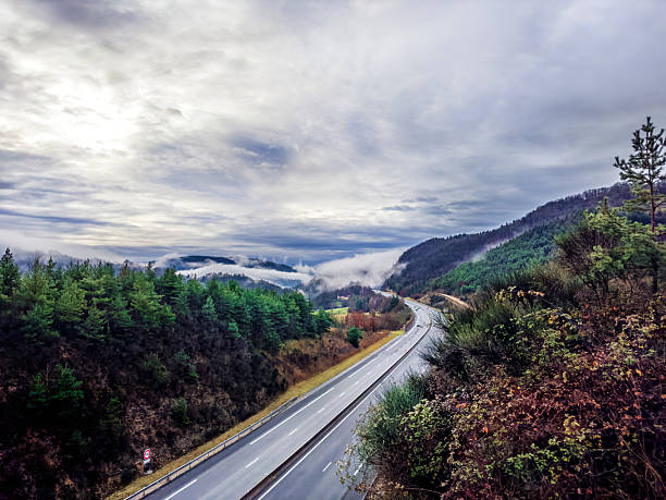 Dramatic landscape of smoky mountain range in Saint-Germain-Du-Teil, France