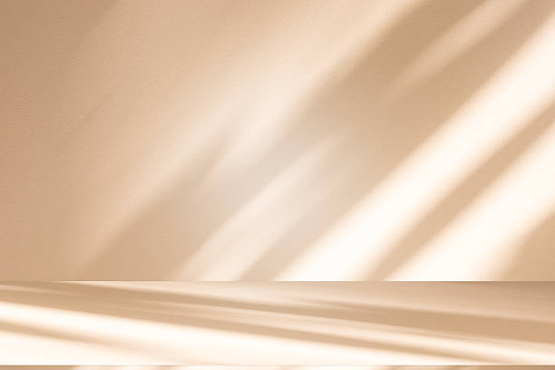 istock Studio style background wall decoration presentation uses white and beige tones. with shadows cast from a nearby window, concept creating a decorative 2240041361