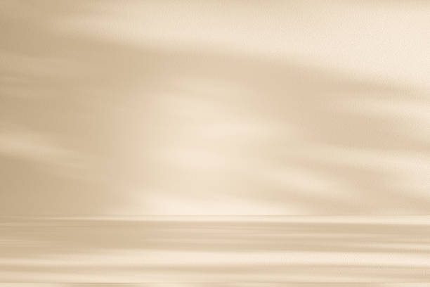 istock Studio style background wall decoration presentation uses white and beige tones. with shadows cast from a nearby window, concept creating a decorative 2240041400