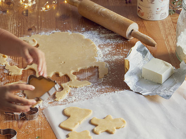 istock girl making Christmas cookies 2240049065