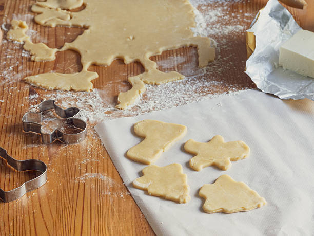 istock girl making Christmas cookies 2240049076